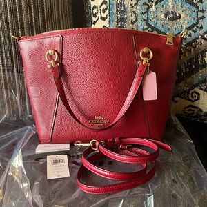 Coach Red Kacey Satchel in colorblock and gold charm in perfect condition.